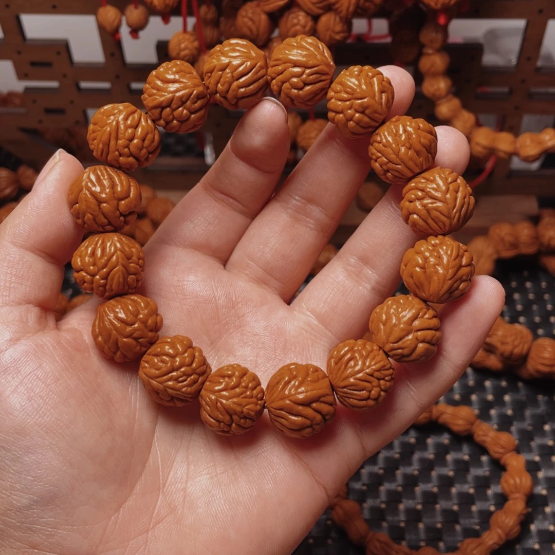 木质类龙纹桃枭手串