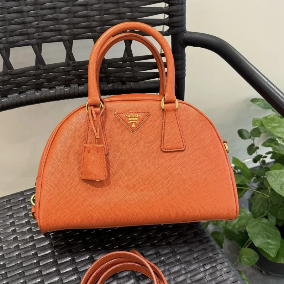 95新 Prada/普拉达 XM/橘子汽水牛皮保龄球手提斜挎包/MS09115946