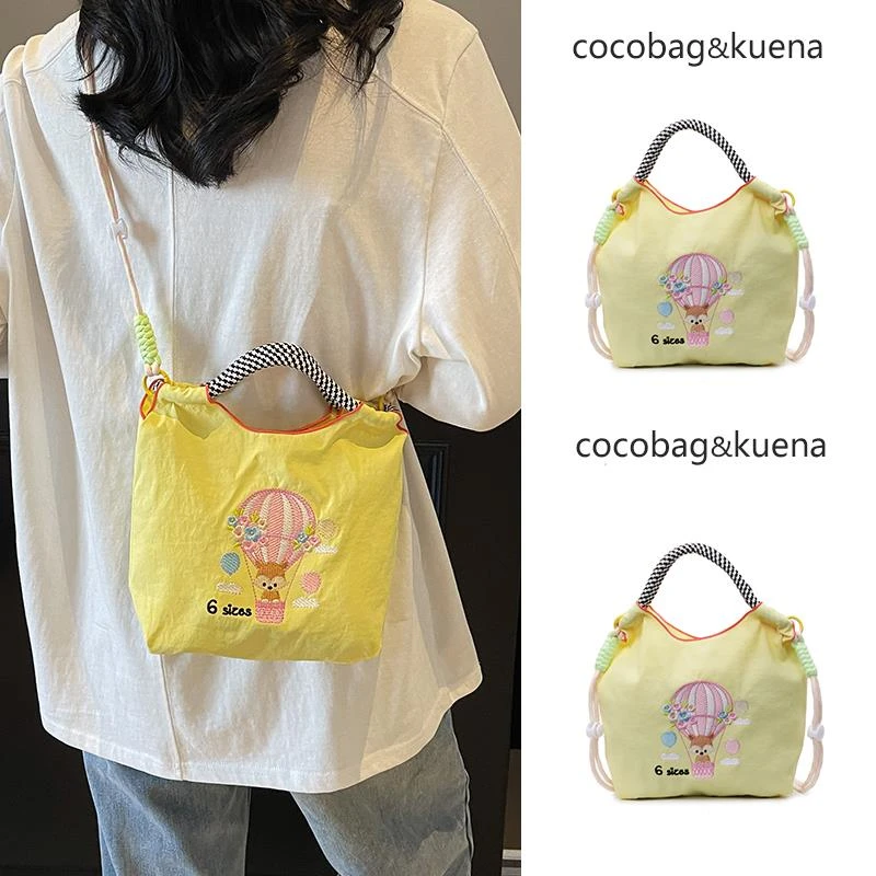 夏天休闲时尚刺绣手提包包女2025新款高级感通勤帆布斜挎包手机包