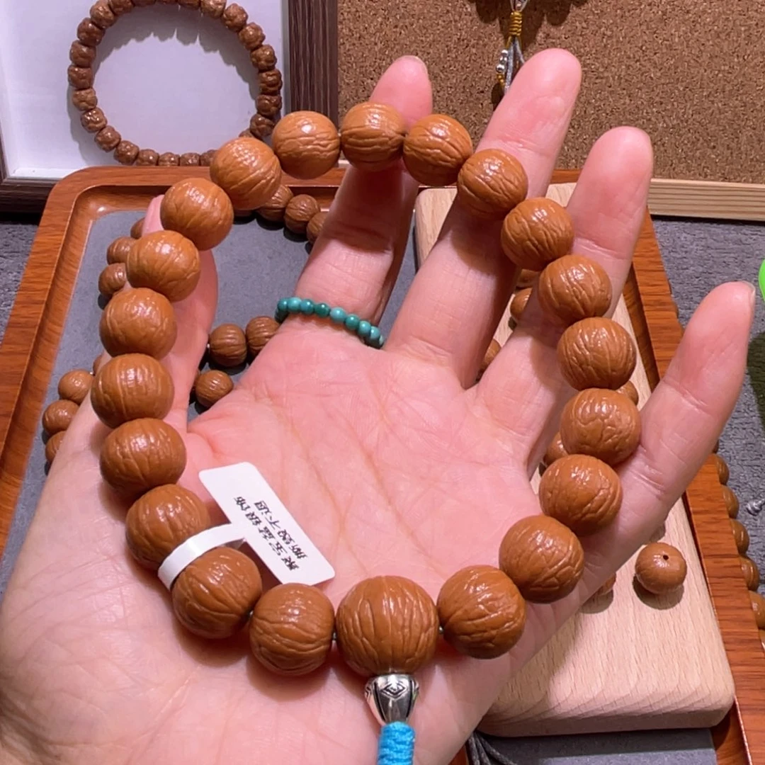 琴***魂吊坠猴头核桃聚宝盆银饰手串