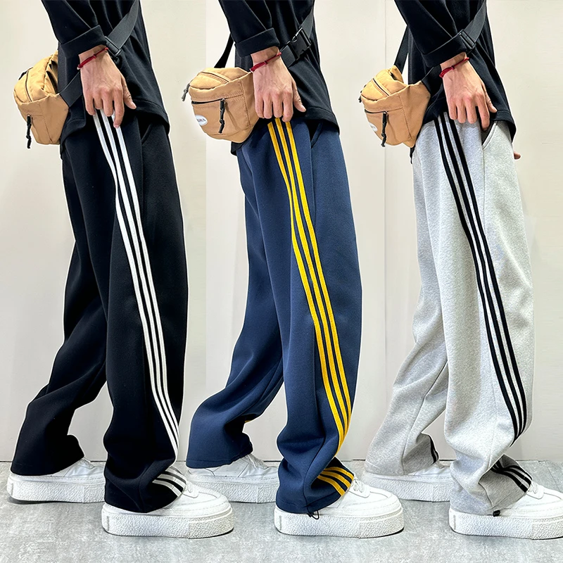 美式潮牌条纹弯刀休闲裤男款设计感秋冬三道杠宽松直筒运动阔腿裤