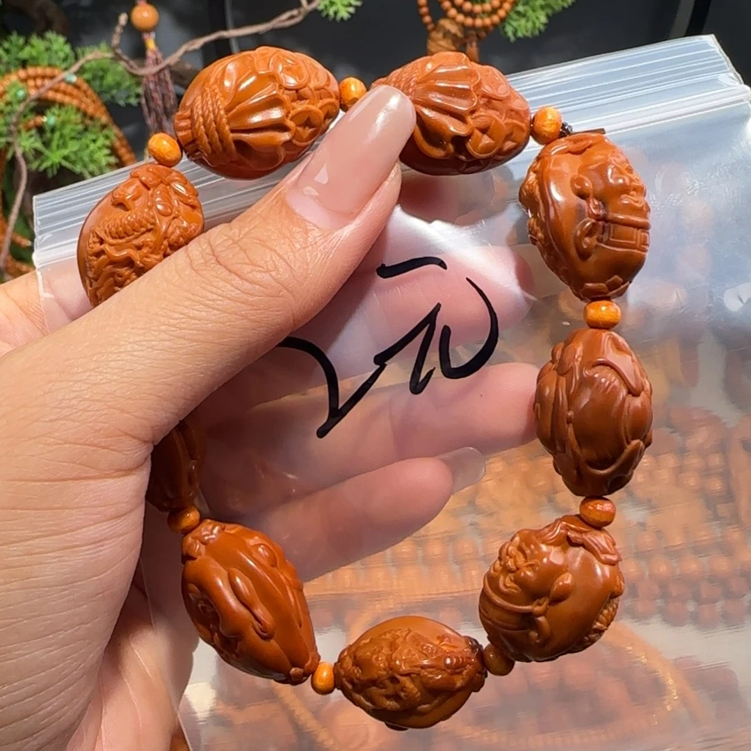 鑫***橄榄核手串/手链福利待遇