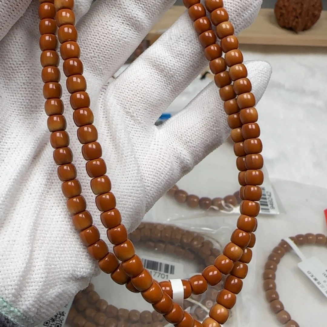 手串橄榄核老挝长串极限弧微色差5.3mm