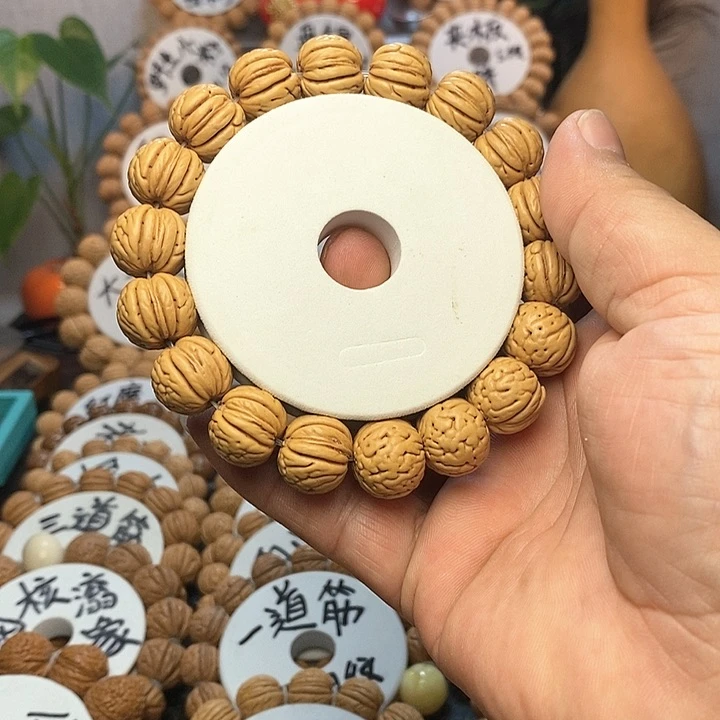 【闪购商品】凹*曼桃核手串手链金丹
