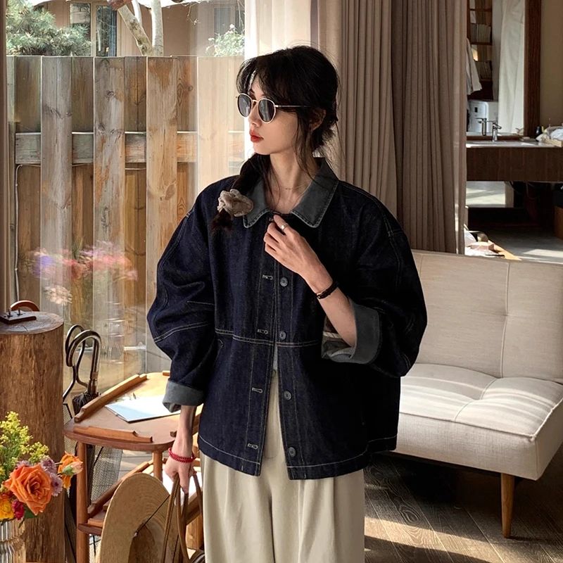 深蓝色时尚设计感拼接牛仔外套女2025春季新款袖口撞色上衣