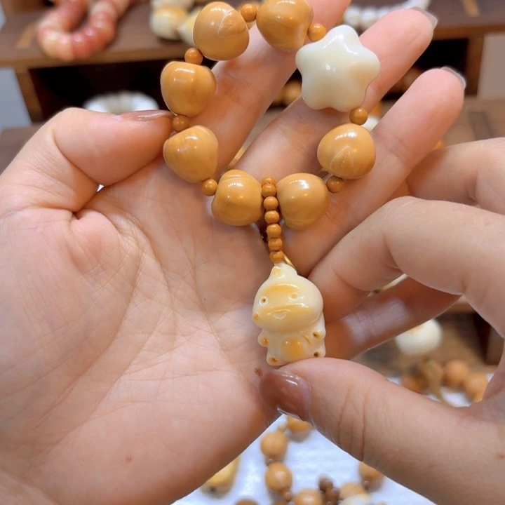 星月菩提吊坠猴头心叶象牙果星星奶龙