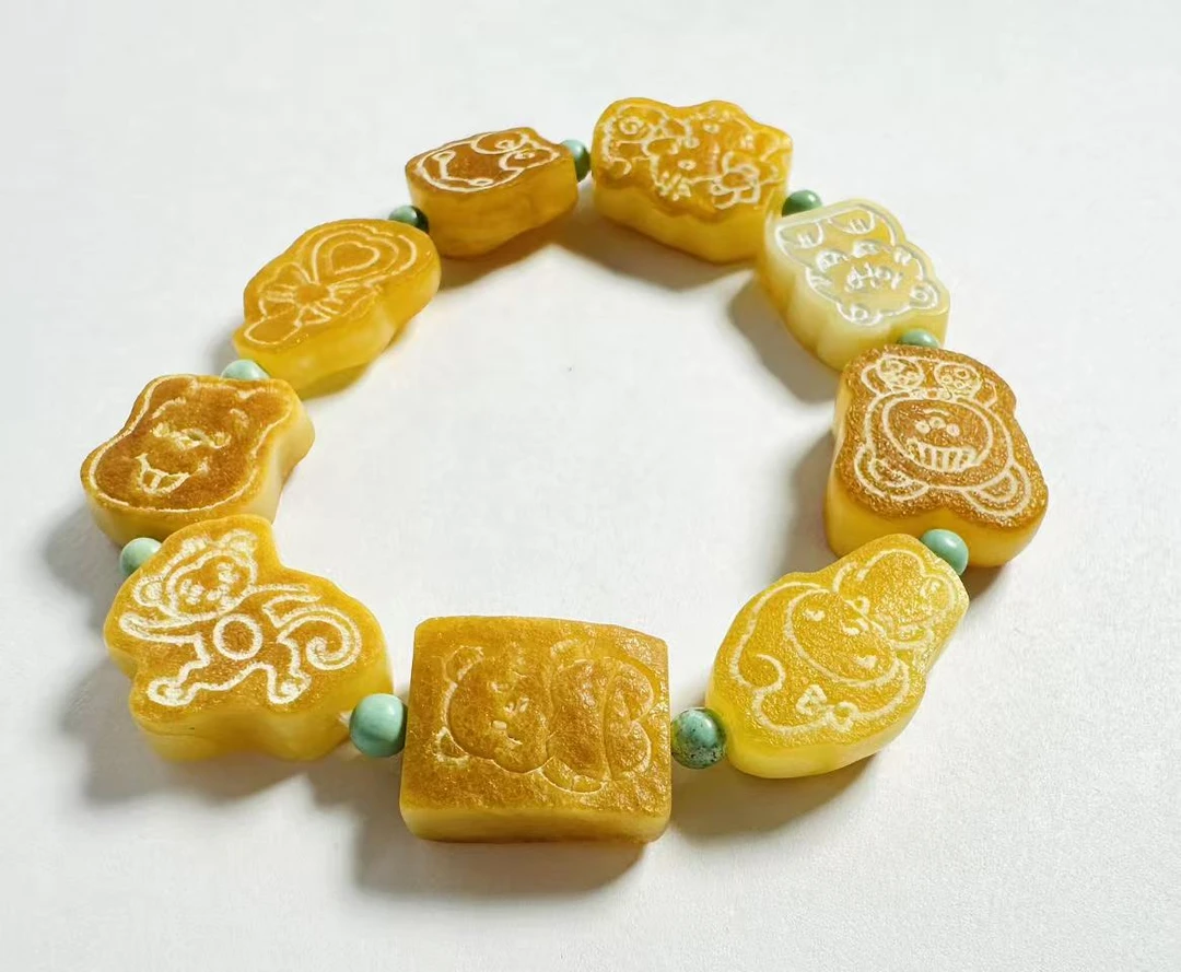 【荣儿】天然蜜蜡原皮小熊饼干单圈手串多样性发其一