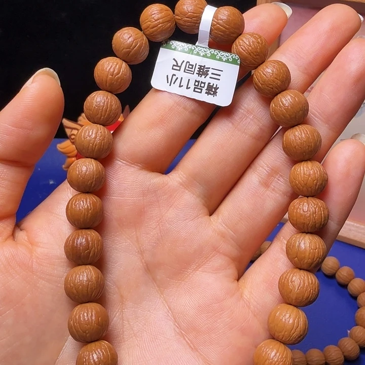 S***g吊坠猴头核桃凤羽