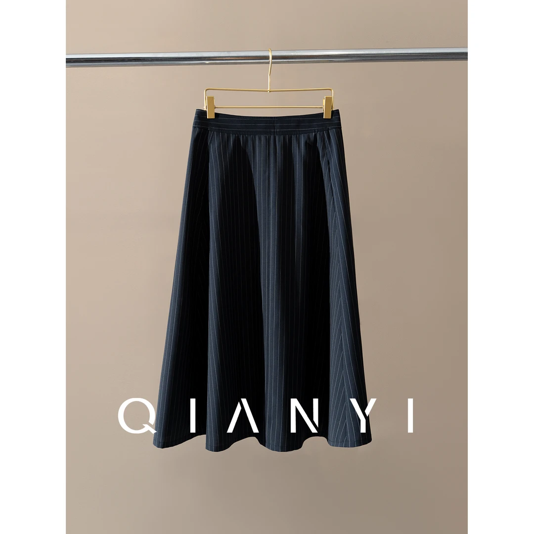 纤屹2025新款春季气质百搭A摆轻奢绵羊毛高级感条纹显瘦半身裙女