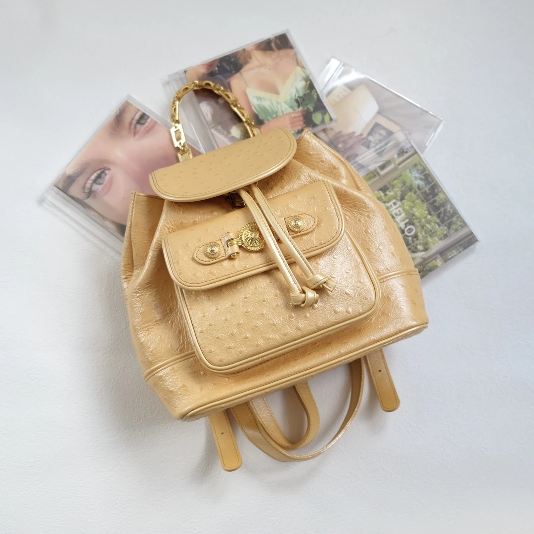 95新 VERSACE/范思哲 辣辣/太阳神小鸡黄珠光鸵鸵双肩包