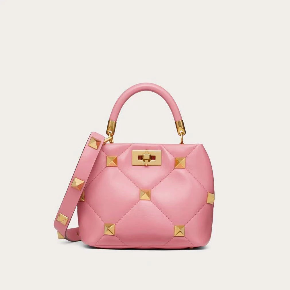 95新 Valentino/华伦天奴 华伦天奴铆钉泡芙手提斜挎包 48193