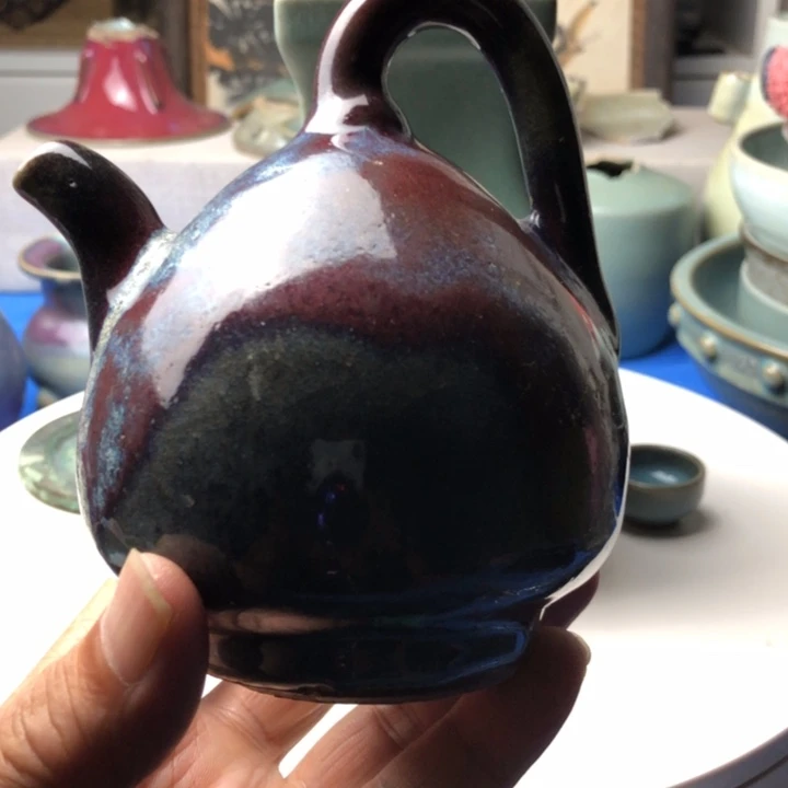 瓶人****他金钧倒流壶，金代！