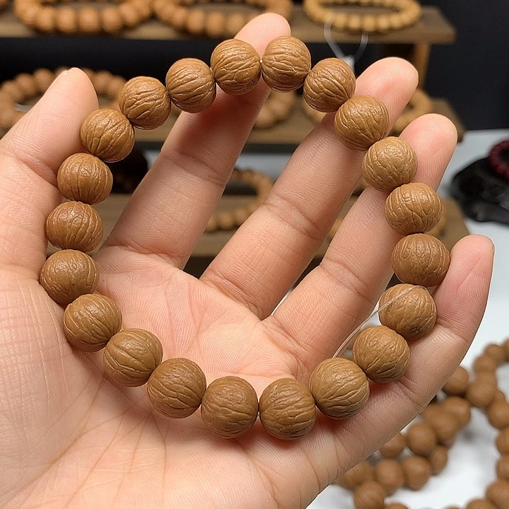 吊坠猴头核桃全品凤羽手串12+