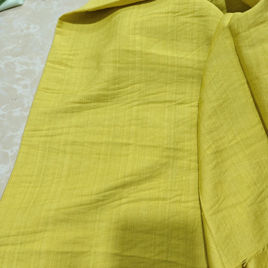 C746 夏季柠檬黄天丝麻服装布料柔软舒适有垂感