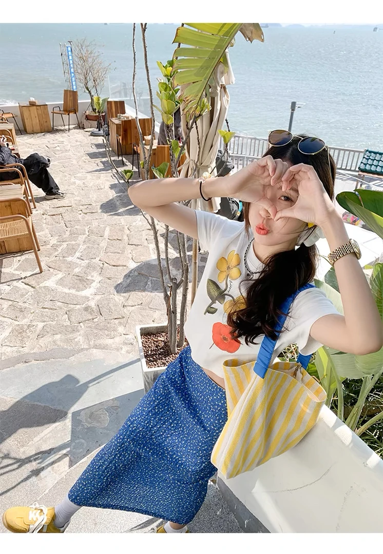 蓝色碎花半身裙女夏季气质半裙后开叉包臀长裙子2025新款