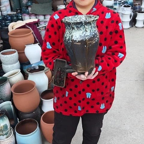 口19高27瑕疵盆子。