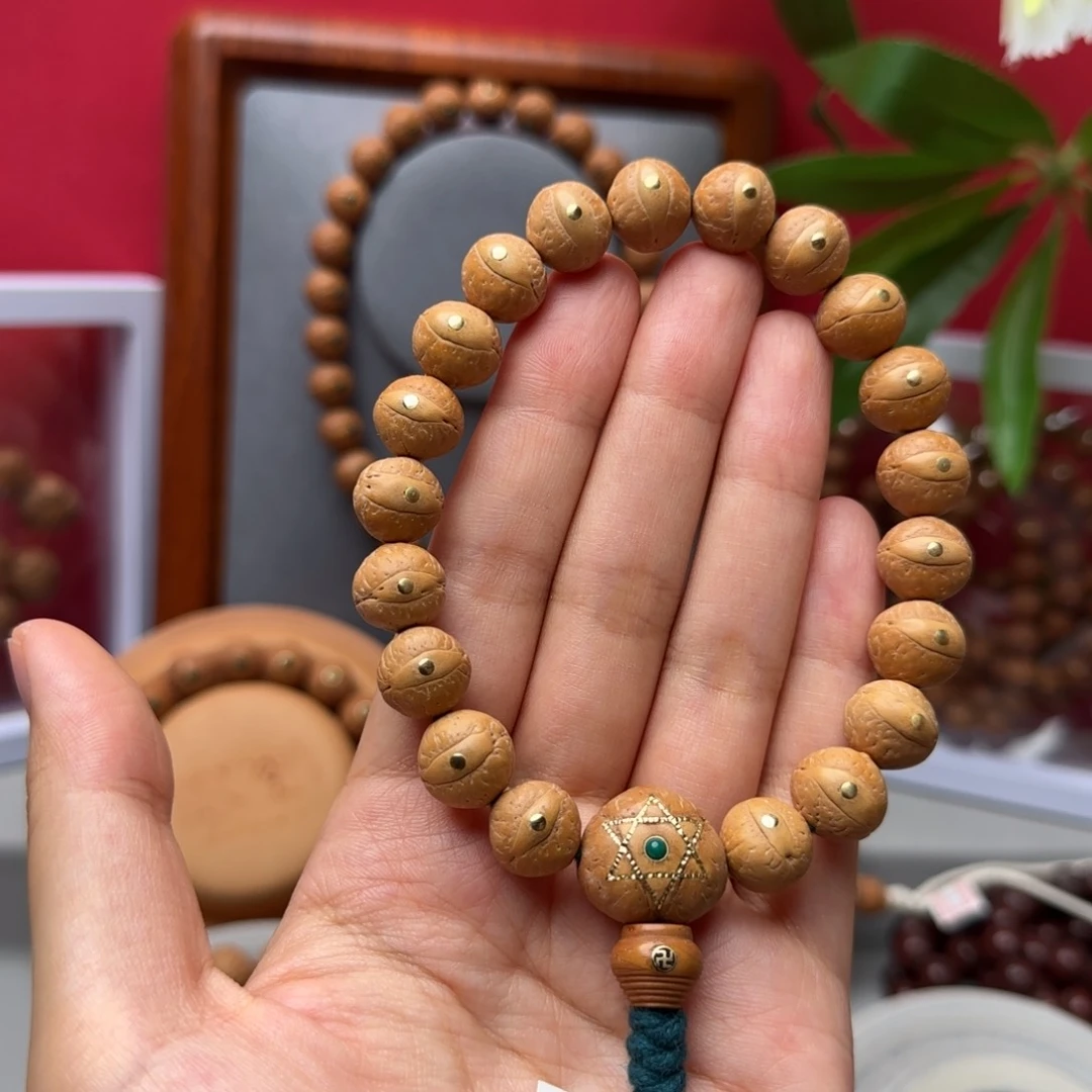 凤眼菩提手串12左右铜钉镶嵌手串