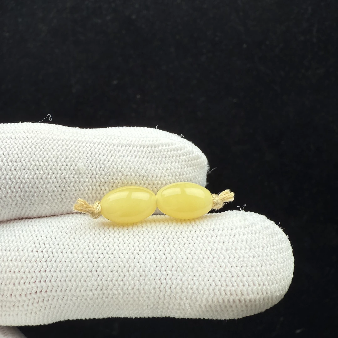 K2563天然原矿蜜蜡 对珠7mm支持复检假一罚十