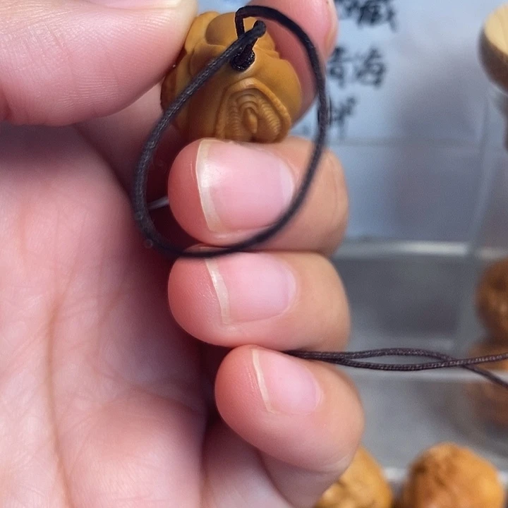 吊坠橄榄核生命，三面