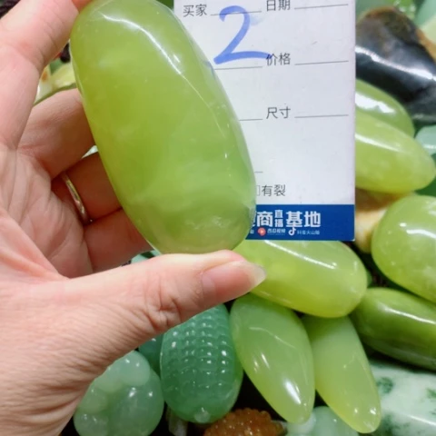 奋***年未镶嵌蛇纹石玉手把件
