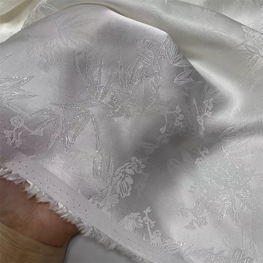 米白纯色暗纹提花萝孔提花碎花不透铜氨棉面料^无弹挺括垂滑R336