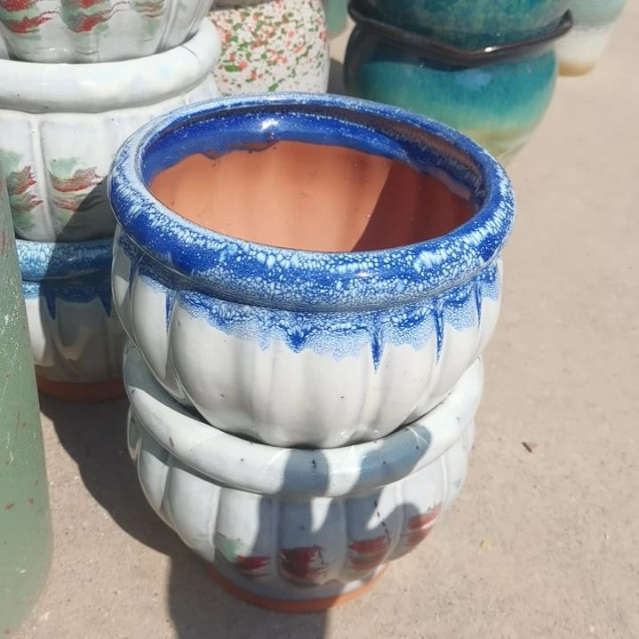 红陶口18高16瑕疵口裂