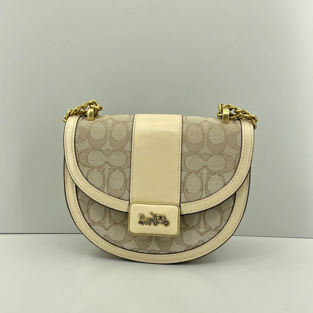 95新 COACH/蔻驰 alie20米白色老花马鞍包20*17*6cmE021405