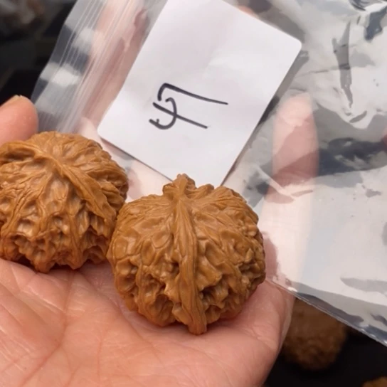 桃核吊坠太***住47苹果圆狮子