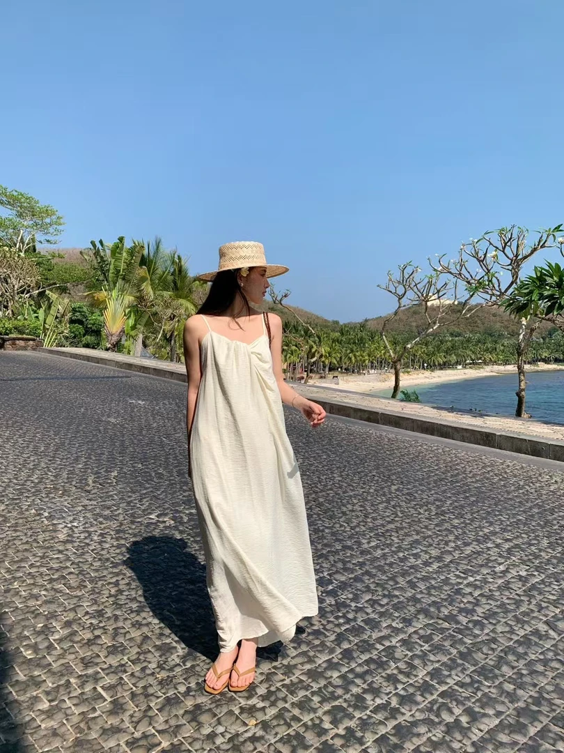 扭结小V领海边旅行度假风吊带连衣裙宽松长裙
