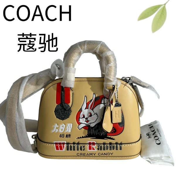 99新 COACH/蔻驰 黄色大白兔贝壳手提斜挎包G25905099底长23X18