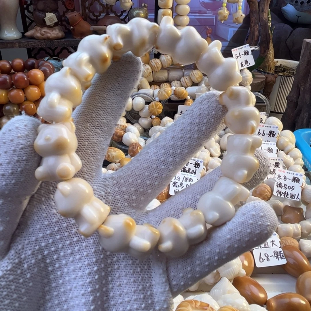菩提根/象牙果手串-点烤色小熊