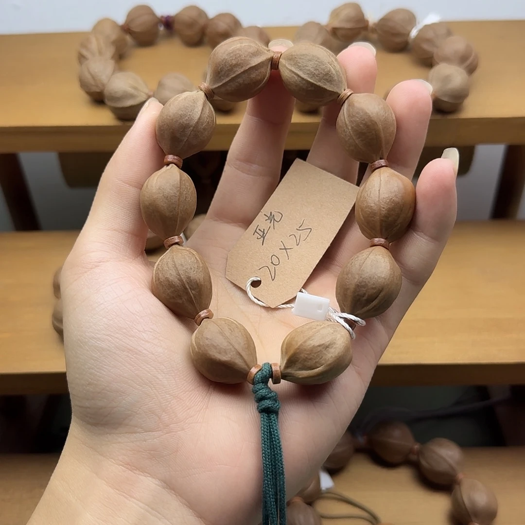 橄榄核吊坠2025梅林铁核手串+21三通