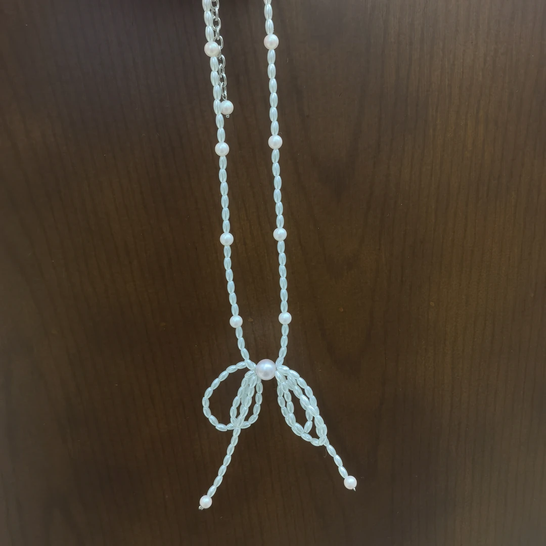 E442白色米粒珠蝴蝶结项链