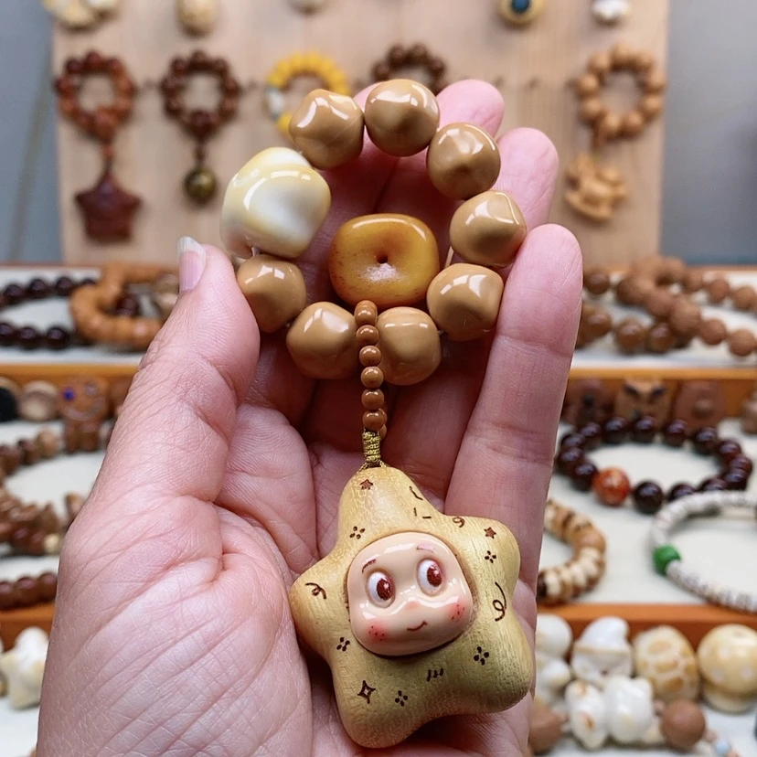 【闪购商品】吊坠猴头核桃阿***巴猴头星星加星星人手持紫色系流苏