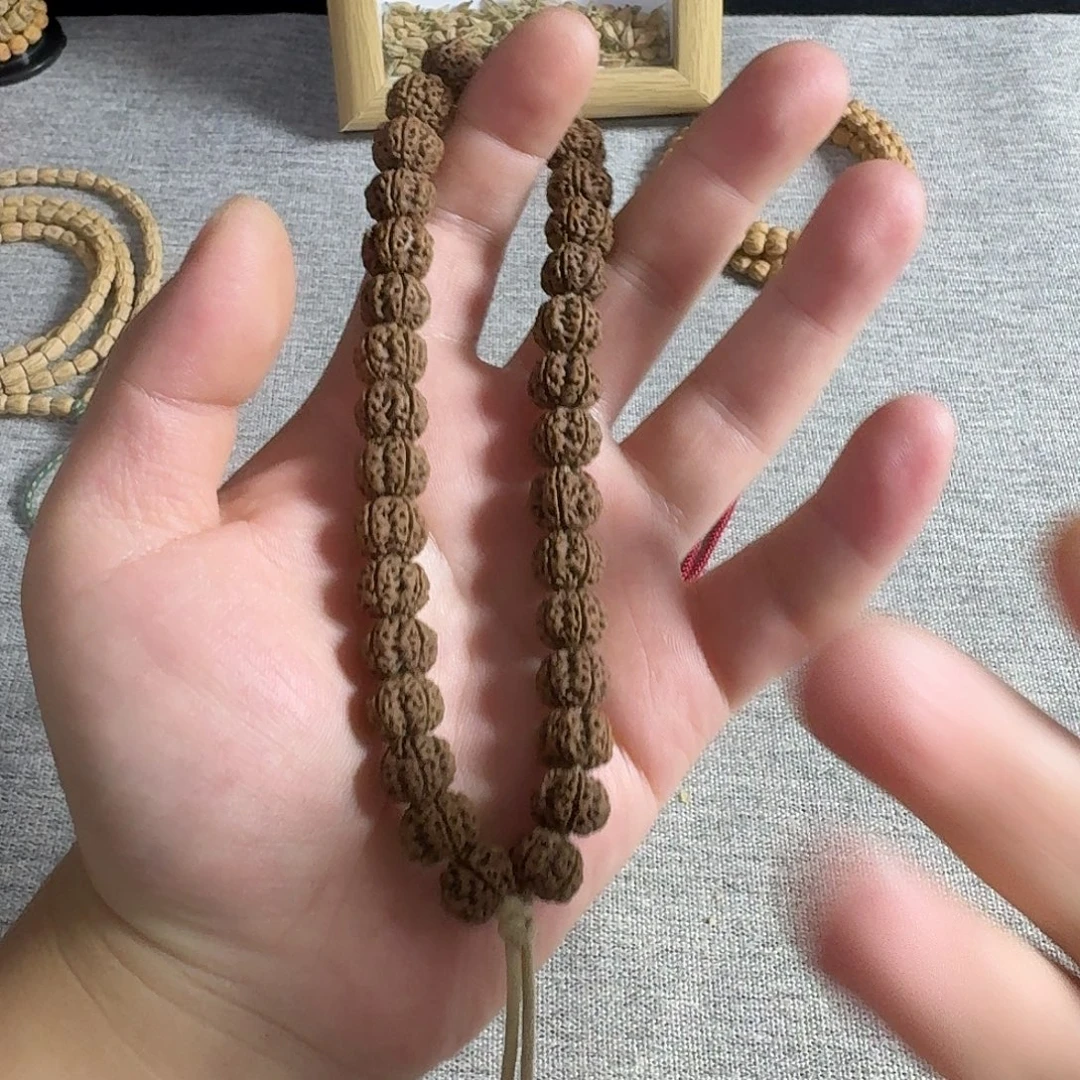 洛***笑柏香籽/百香籽吊坠