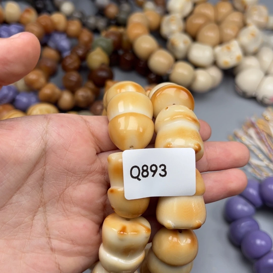 宝***园菩提根/象牙果吊坠Q893丁丁25-27微瑕一串