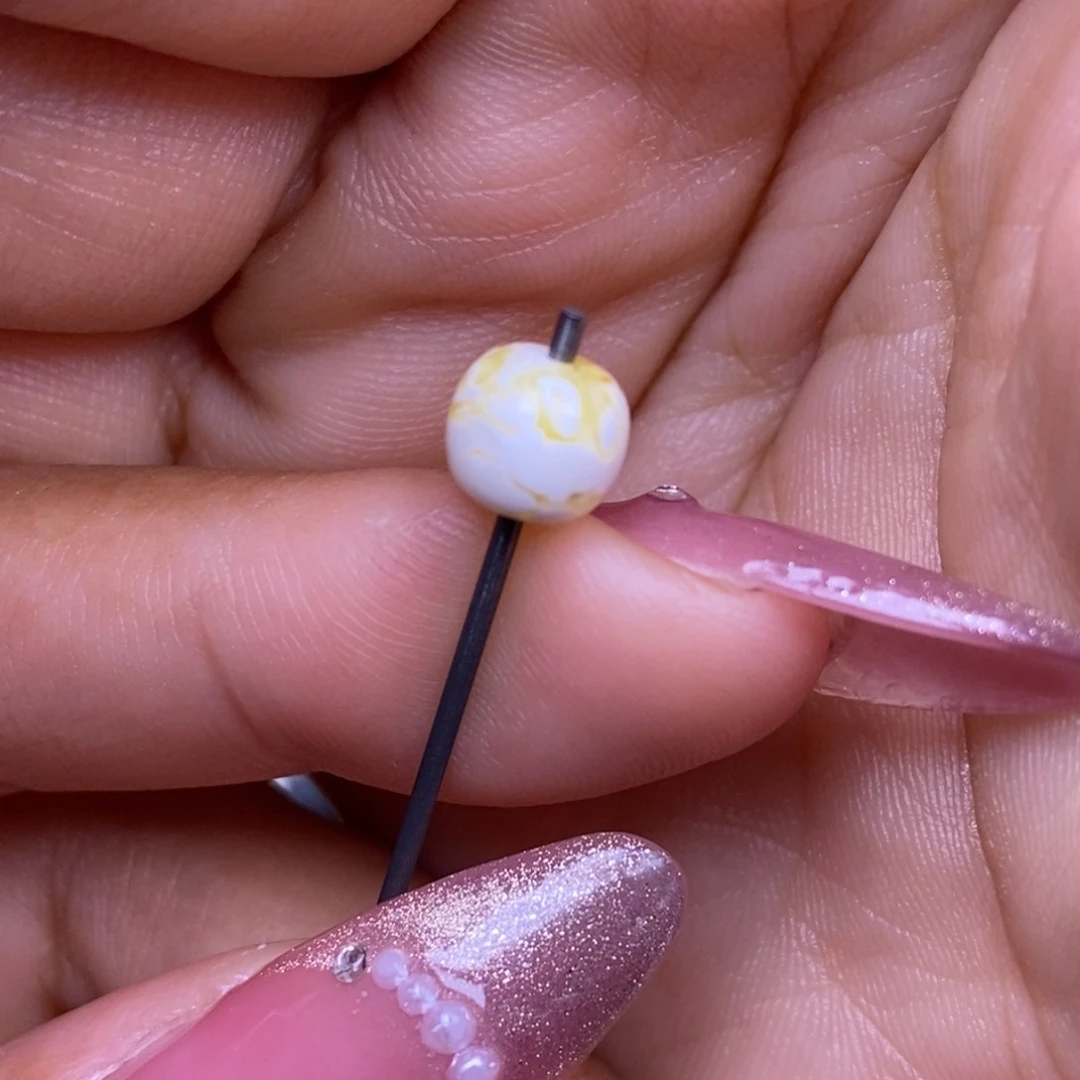 吖***琥珀未镶嵌裸石漆白妖花老型7*6.3mm