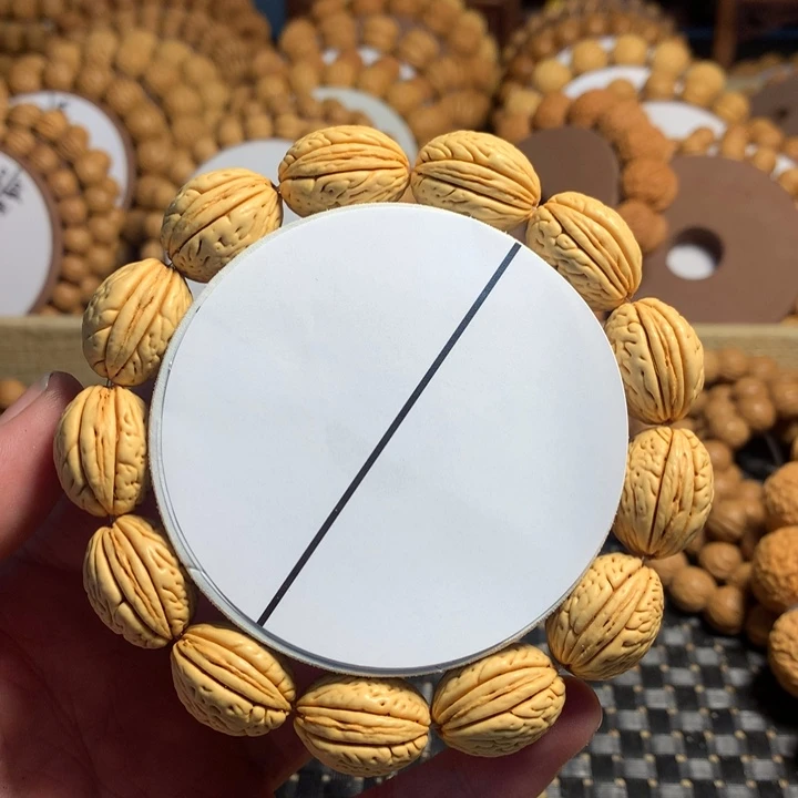 芊***芊手串桃核5#龙鳞柳叶钱袋