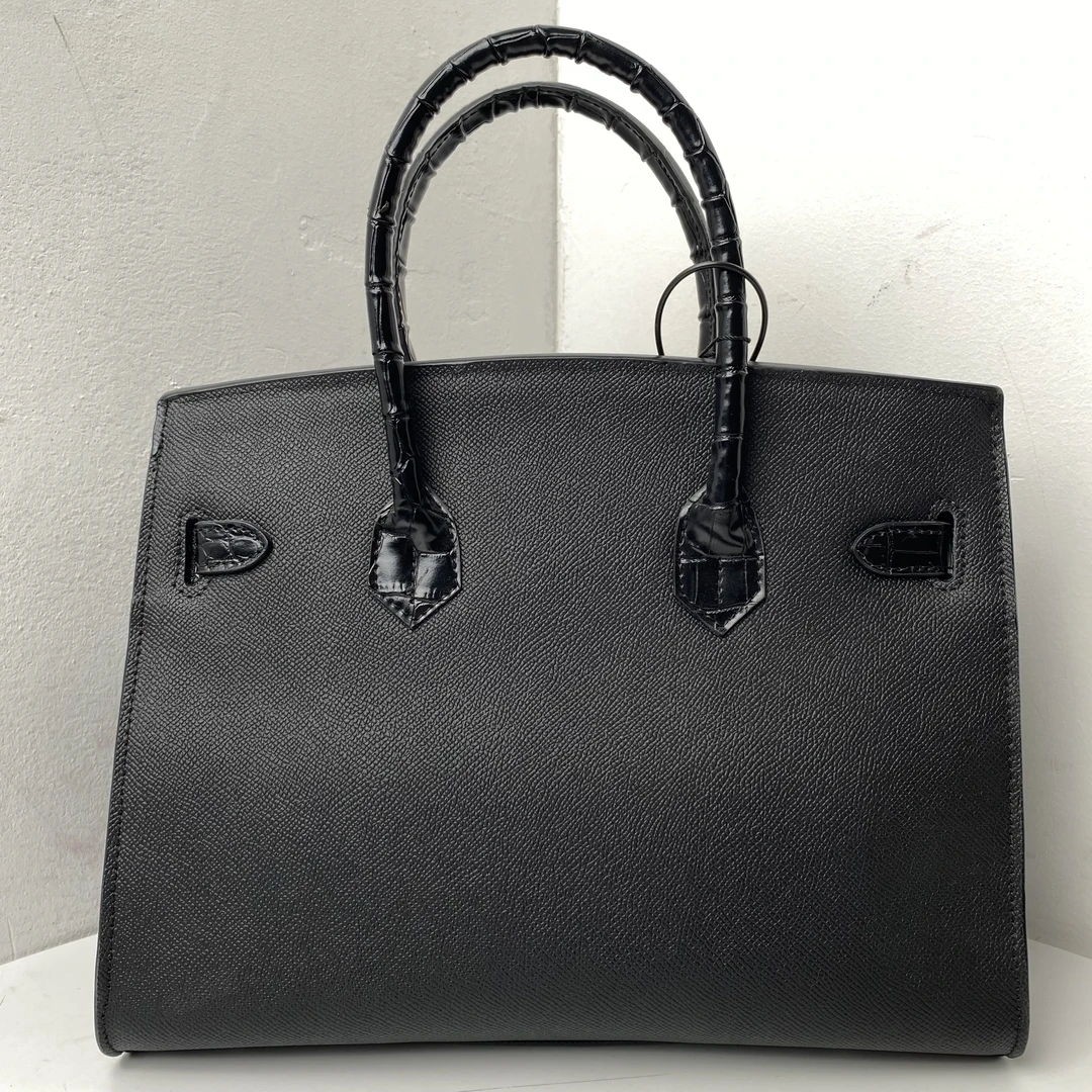 1554【赠小马挂件和雨衣袋】精品女包单肩斜挎