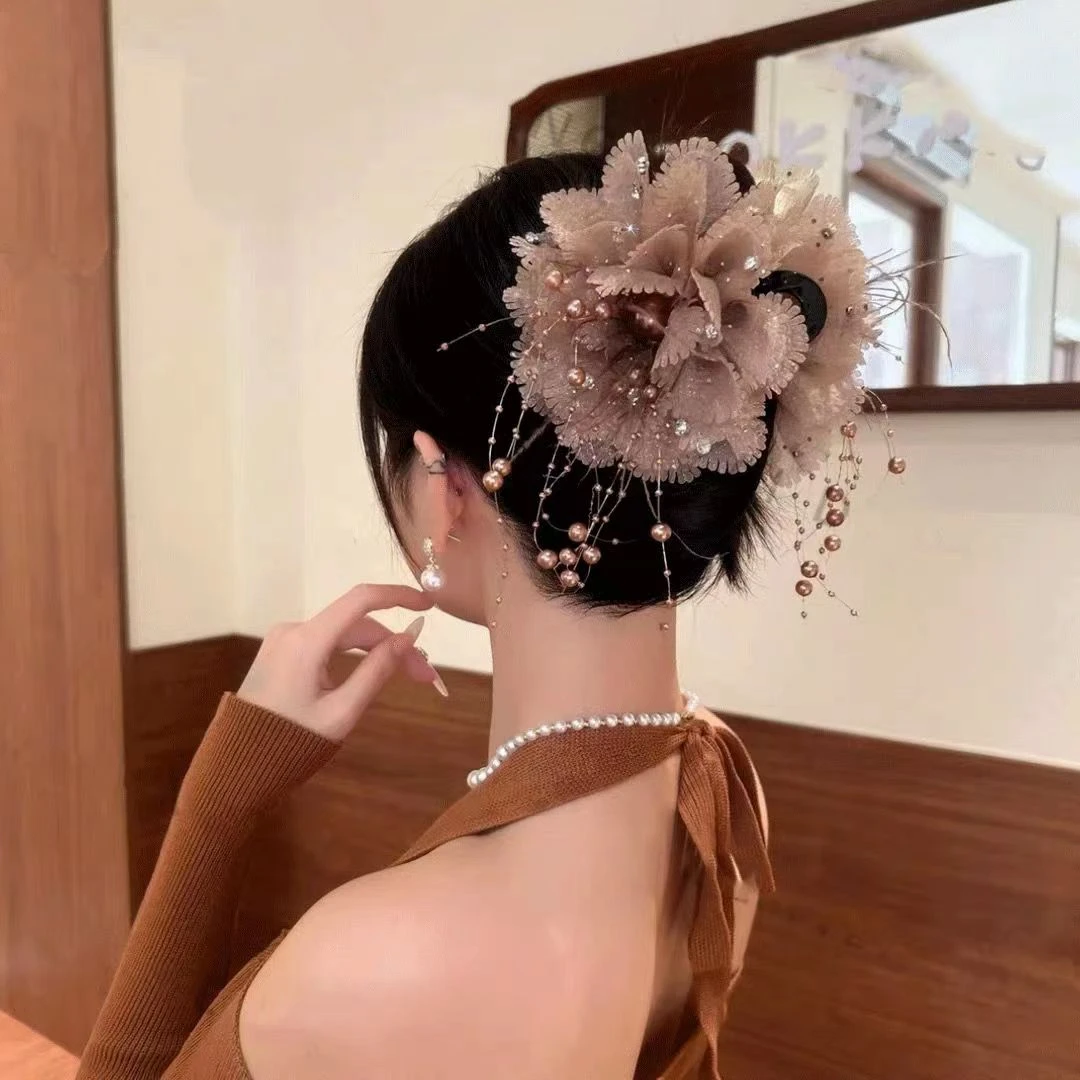 纯欲风凤羽花苞抓夹秋冬轻奢高级感气质时尚百搭优雅韩式超仙复古