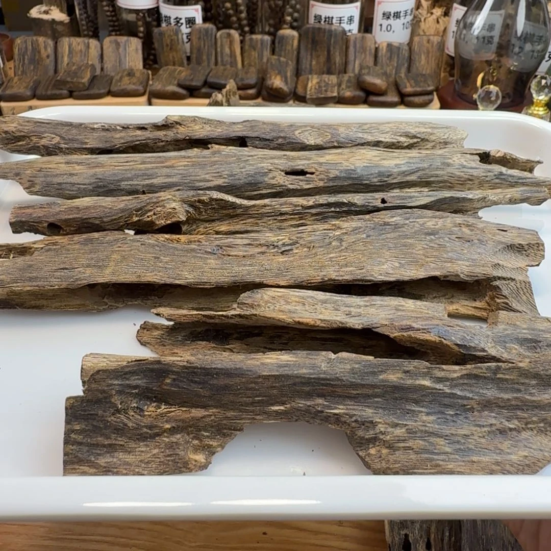 菩***心香料绿棋树心油块料108克