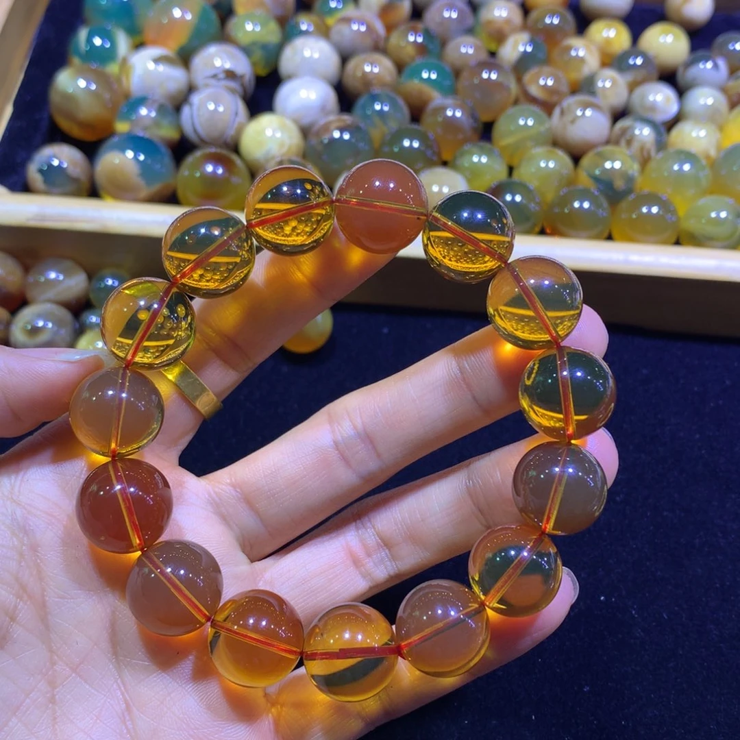 琥珀裸石未镶嵌一*游血红茶串，不退不换