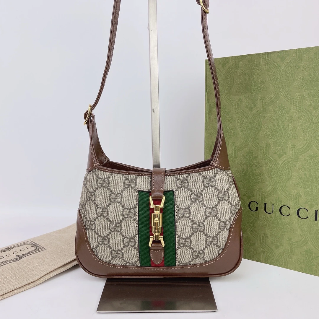 99新 GUCCI/古驰 古驰 棕色老花腋下包底长19 E497