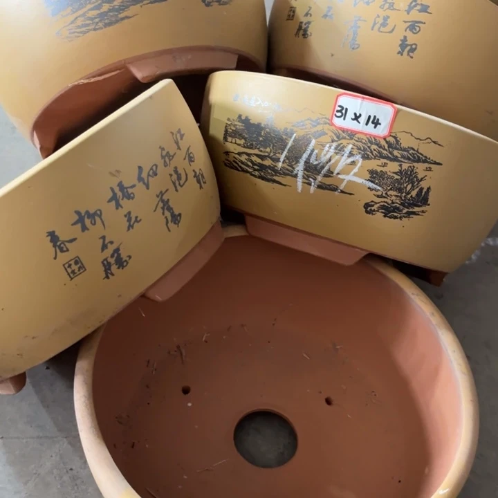 紫砂花盆100-5。       31-14微瑕