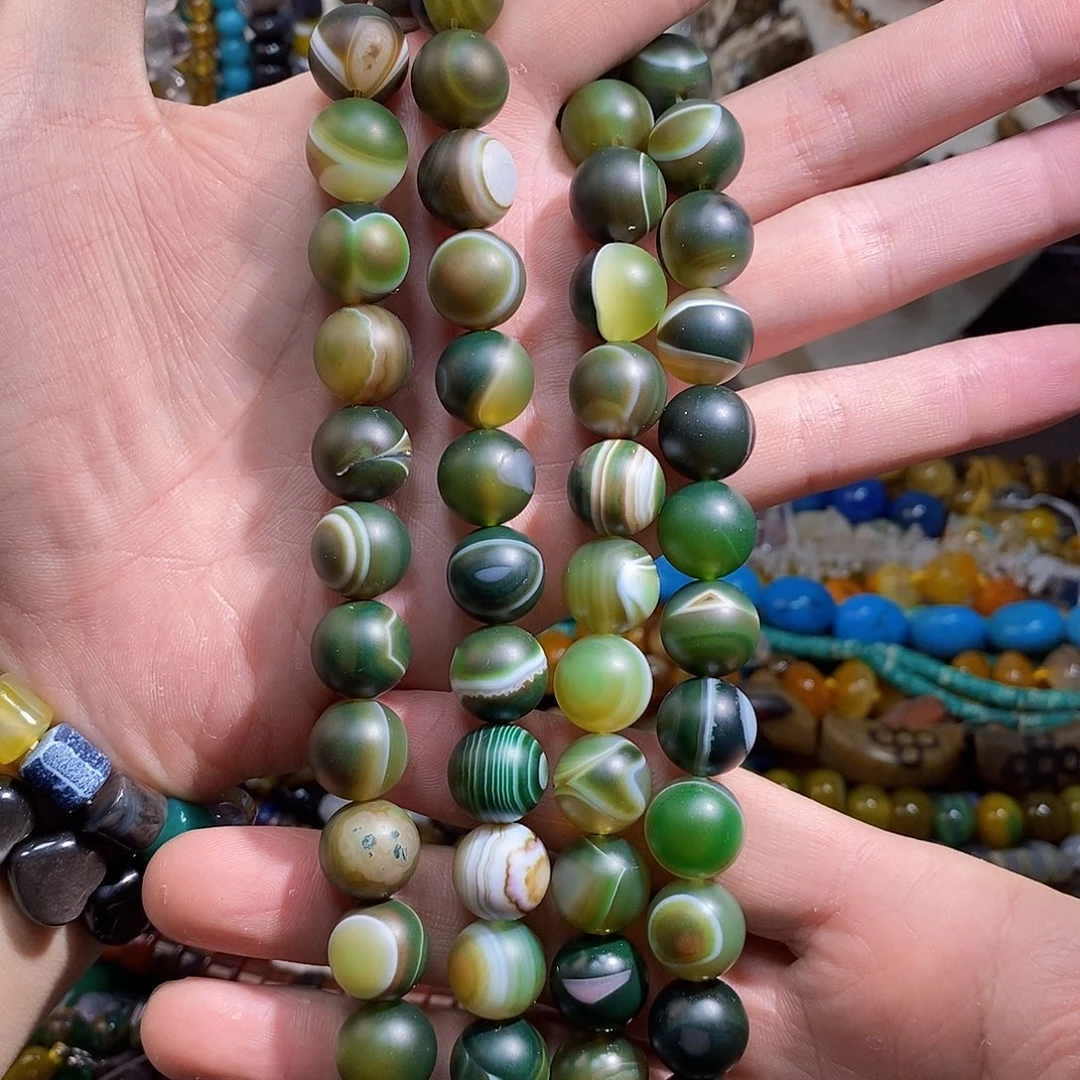 石英质玉未镶嵌，墨绿色缠丝玛瑙天眼14mm，磨砂，