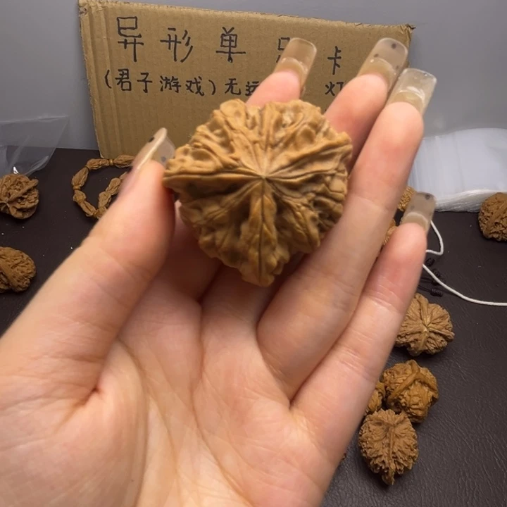 追***梦吊坠桃核三棱单只异型有瑕