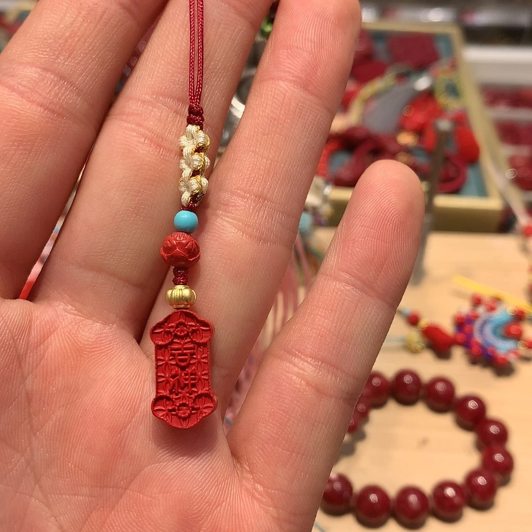 天然辰砂红砂吉祥牌子手机吊坠