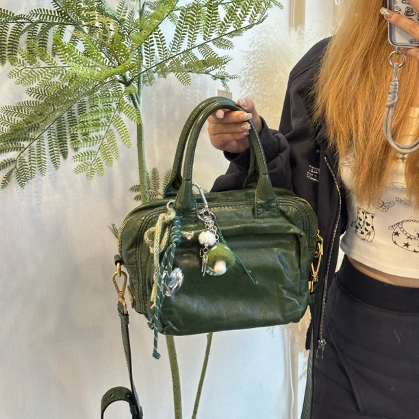 95新 Prada/普拉达 绿色油蜡皮侧标手提斜挎包