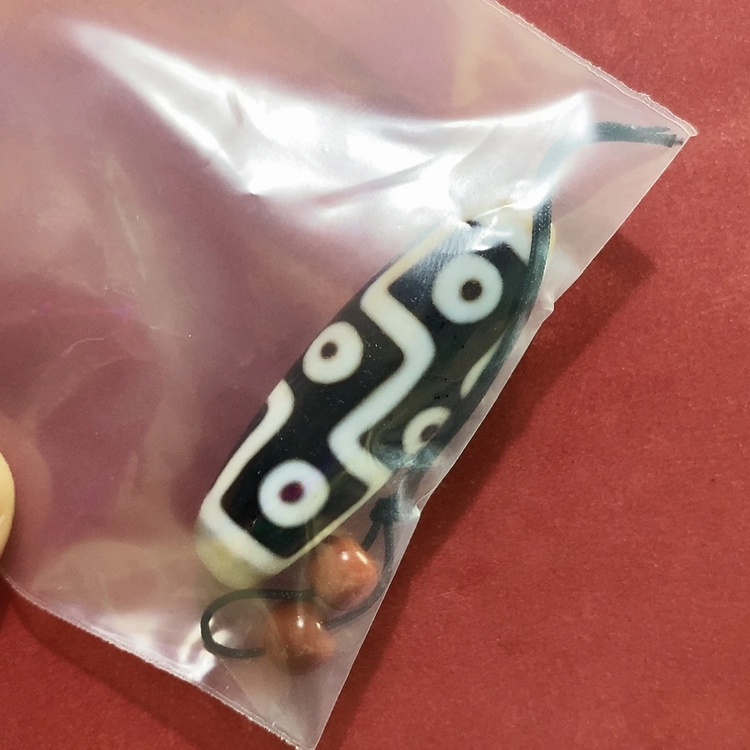 刘***祯玛瑙/玉髓合金颈饰行运九眼
