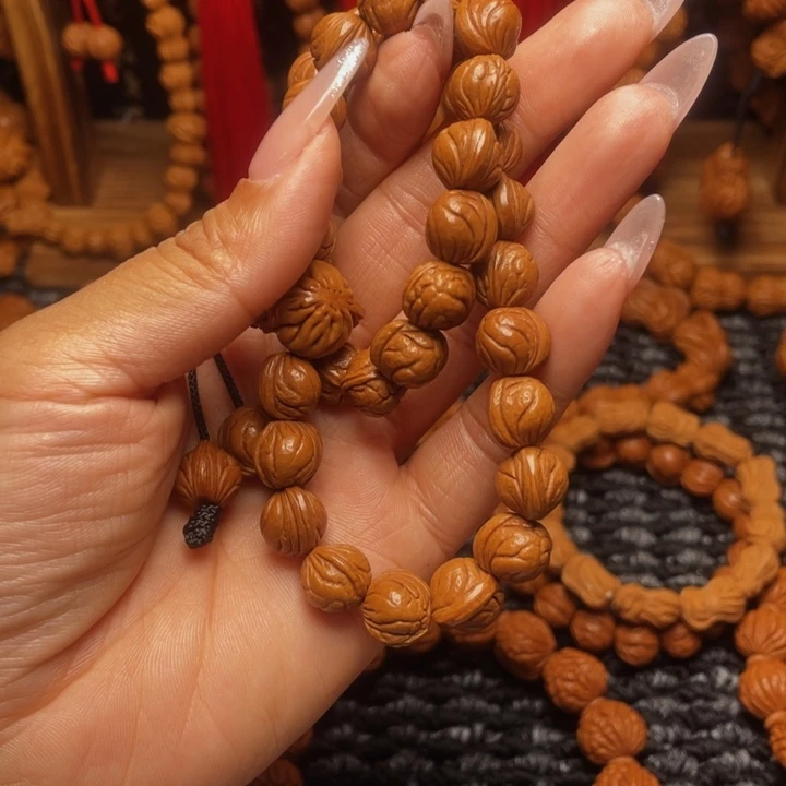 吸***¹菩提籽类龙纹桃枭挂件